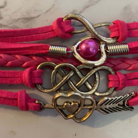 A Hot Pink bracelet with 4 charms - Picture 2 of 4